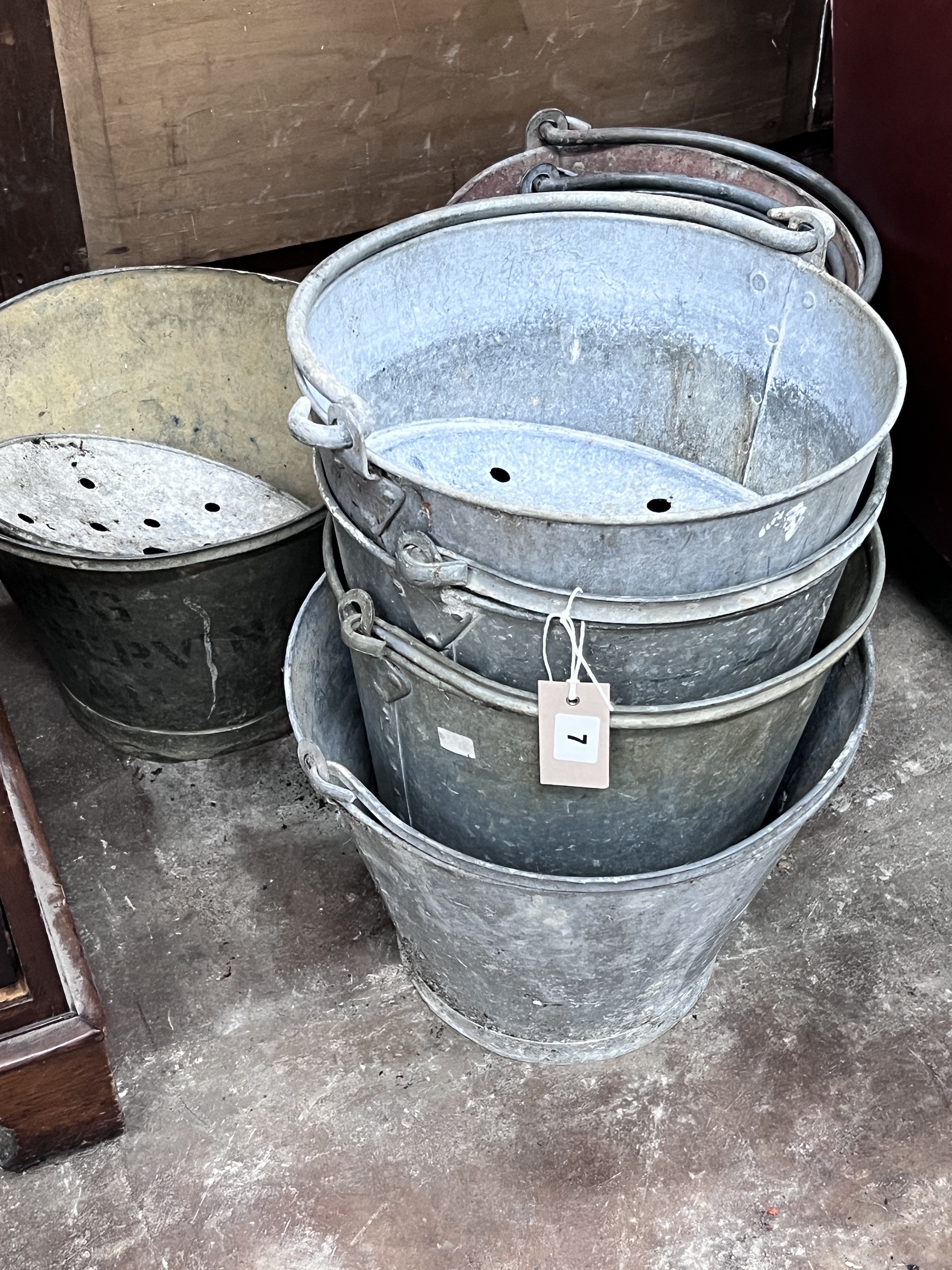 Seven vintage galvanised fire extinguisher buckets, largest height 32cm